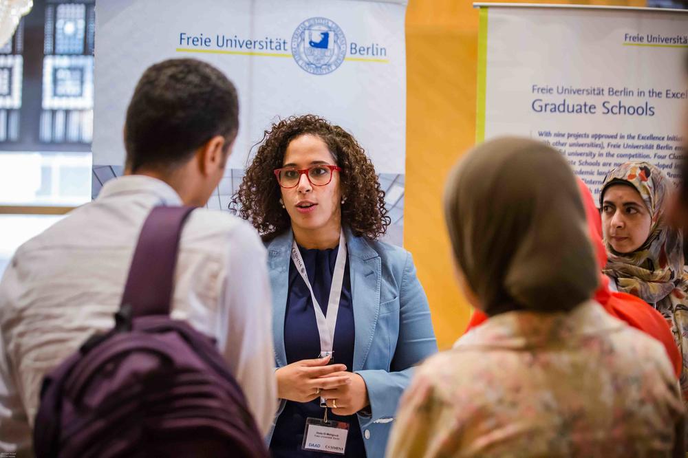 Hoda El Mahgoub, head of the Cairo Office of Freie Universität Berlin, at an information stand.