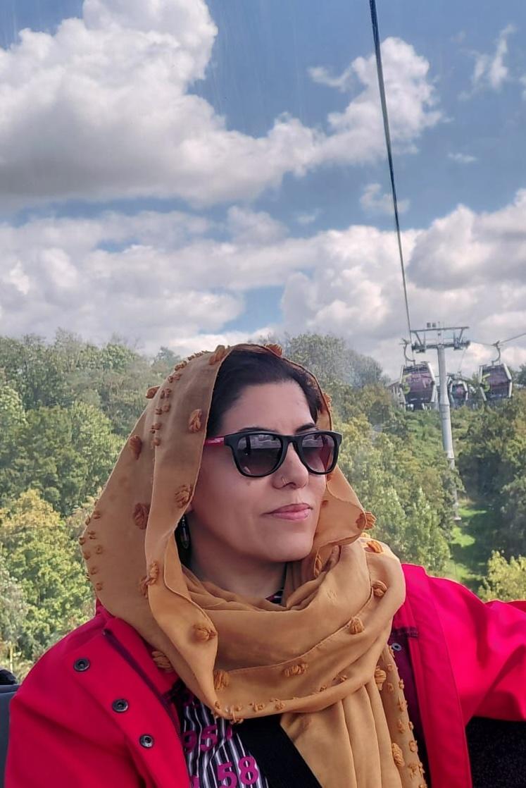 Abida Bano on her way up a chairlift ride at the Gärten der Welt (Berlin).