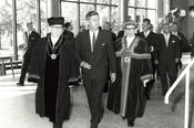 Accompanied by the rectors of Freie Universität, Kennedy proceeds to the rostrum.